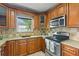 Well-equipped kitchen boasts stainless steel appliances and granite countertops at 2902 W Lemon St, Tampa, FL 33609