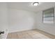 Neutral bedroom with a window and tile floors at 3204 Dodge St, Tampa, FL 33605