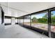 Screened in patio with painted walls and view of back yard at 3204 Dodge St, Tampa, FL 33605