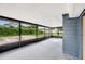Enclosed screened in patio with view of back yard at 3204 Dodge St, Tampa, FL 33605