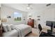 Bedroom showcasing a relaxing view, and a comfortable bed, perfect for relaxation at 32490 Tree Of Life Ave, Wesley Chapel, FL 33543