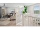 Bright loft area with comfortable seating, stylish decor, and open staircase at 32490 Tree Of Life Ave, Wesley Chapel, FL 33543