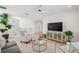 Bright loft area with comfortable seating, stylish decor, and a welcoming atmosphere at 32490 Tree Of Life Ave, Wesley Chapel, FL 33543