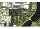 Aerial view showcasing the lot location near Garden Lane surrounded by trees and commercial areas at 4210 Garden Ln, Tampa, FL 33610