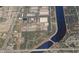 Excellent aerial view of the property near a waterway, with some trees and shopping centers nearby at 4210 Garden Ln, Tampa, FL 33610
