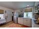 Bright kitchen with stainless steel appliances, cozy breakfast nook, and ample counter space at 4742 13Th N Ave, St Petersburg, FL 33713