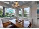 Kitchen dining nook with stained-glass window view and built-in seating area at 4742 13Th N Ave, St Petersburg, FL 33713