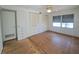 Bedroom featuring built-in closets, a ceiling fan, and a window, providing comfort and natural light at 4851 W Gandy Blvd # B12L23, Tampa, FL 33611
