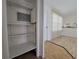 Storage space with open shelving, providing ample room for organization and showcasing functionality at 4851 W Gandy Blvd # B12L23, Tampa, FL 33611