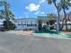 Charming single-story home featuring a carport, well-maintained landscaping, and inviting curb appeal at 4851 W Gandy Blvd # B12L23, Tampa, FL 33611