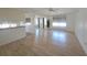 A spacious living room filled with natural light, wood floors, and an open layout at 4851 W Gandy Blvd # B12L23, Tampa, FL 33611