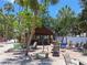 Charming community outdoor pavilion area featuring picnic tables, BBQ grill and seating at 4851 W Gandy Blvd # B12L23, Tampa, FL 33611