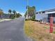 Picturesque community street featuring well-maintained homes, mature trees, and a serene atmosphere at 4851 W Gandy Blvd # B12L23, Tampa, FL 33611
