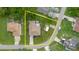 An aerial view of the home, its roof, driveway, and lot at 4959 Cromey Rd, North Port, FL 34288