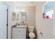 Bathroom with granite countertops and white cabinetry at 4959 Cromey Rd, North Port, FL 34288