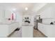 Spacious kitchen featuring stainless steel appliances, granite counters, and ample storage at 4959 Cromey Rd, North Port, FL 34288