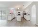 A spacious kitchen with granite countertops, stainless steel appliances and tile flooring at 4959 Cromey Rd, North Port, FL 34288