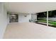 Covered patio featuring an open-air design and tile flooring at 4959 Cromey Rd, North Port, FL 34288