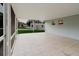 An enclosed patio with three windows overlooking the yard at 4959 Cromey Rd, North Port, FL 34288