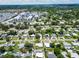 Scenic aerial view of a residential neighborhood with lush greenery and community amenities at 5600 Hobson Ne St, St Petersburg, FL 33703