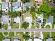 Overhead aerial perspective of a residential street, revealing roof types and yard layouts at 5600 Hobson Ne St, St Petersburg, FL 33703
