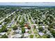 Aerial view of a home surrounded by lush greenery and nearby neighborhood amenities at 5600 Hobson Ne St, St Petersburg, FL 33703