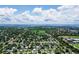 Wide aerial shot of a residential area with sports fields near bay waters at 5600 Hobson Ne St, St Petersburg, FL 33703
