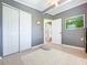 Bedroom featuring a closet and access to an adjacent room at 5600 Hobson Ne St, St Petersburg, FL 33703