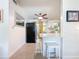 Bright eat-in kitchen featuring white cabinets, breakfast bar, and stainless appliances at 5600 Hobson Ne St, St Petersburg, FL 33703