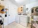 A laundry area with washer, dryer, water heater in the basement at 5600 Hobson Ne St, St Petersburg, FL 33703