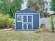 Close up of the backyard shed with window box at 5600 Hobson Ne St, St Petersburg, FL 33703