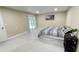 Bedroom features sliding door to pool area at 5614 Kenny Dr, Tampa, FL 33617