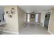 Bright dining area with a large window for natural light and neutral wall paint at 5614 Kenny Dr, Tampa, FL 33617