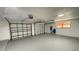 Spacious two-car garage with new epoxy flooring at 5614 Kenny Dr, Tampa, FL 33617