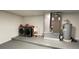 Basement laundry room has a washer, dryer, utility sink and storage shelving at 5614 Kenny Dr, Tampa, FL 33617