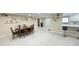 An expansive living room provides versatile spaces for dining, living, and entertaining at 5614 Kenny Dr, Tampa, FL 33617
