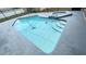 A refreshing pool and integrated spa provide a serene escape in this home's outdoor living space at 5614 Kenny Dr, Tampa, FL 33617