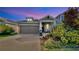 Charming home with two-car garage, inviting front porch and beautiful landscaping at 5645 Del Coronado Dr, Apollo Beach, FL 33572