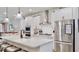 Modern kitchen with island seating and stainless steel appliances at 5645 Del Coronado Dr, Apollo Beach, FL 33572
