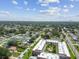 Aerial neighborhood view with condos, and the city skyline offers a glimpse of the area at 5728 14Th N Ave # 101B, St Petersburg, FL 33710