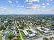 Aerial neighborhood view with condos and green space showcases the proximity to amenities at 5728 14Th N Ave # 101B, St Petersburg, FL 33710