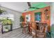 Charming bar with wood cabinets and a colorful art piece at 5728 14Th N Ave # 101B, St Petersburg, FL 33710