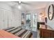 Bright bedroom features ensuite access and an illuminated ceiling fan and ample closet space at 5728 14Th N Ave # 101B, St Petersburg, FL 33710
