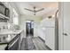 Kitchen with stainless steel appliances and natural light at 5728 14Th N Ave # 101B, St Petersburg, FL 33710