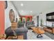 Cozy living room with hardwood floors, modern decor, and ample seating at 5728 14Th N Ave # 101B, St Petersburg, FL 33710