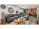 Comfortable living room with hardwood floors, modern decor, and bright window at 5728 14Th N Ave # 101B, St Petersburg, FL 33710
