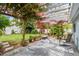 Lush backyard featuring a pergola-covered patio, green lawn, and privacy fence at 5961 36Th Ave N, St Petersburg, FL 33710