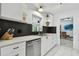 Bright kitchen featuring stainless steel appliances, white cabinetry, and modern countertops at 5961 36Th Ave N, St Petersburg, FL 33710