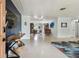 Bright living area showcasing sleek terrazzo flooring, stylish furnishings, and an inviting open layout at 5961 36Th Ave N, St Petersburg, FL 33710