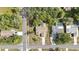 Overhead shot of property showing location, nearby trees and proximity to other homes at 6121 Piedmont Dr, Spring Hill, FL 34606